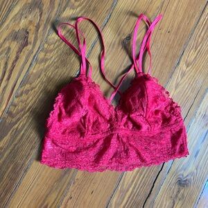 Red lace bralette with crisscross straps
